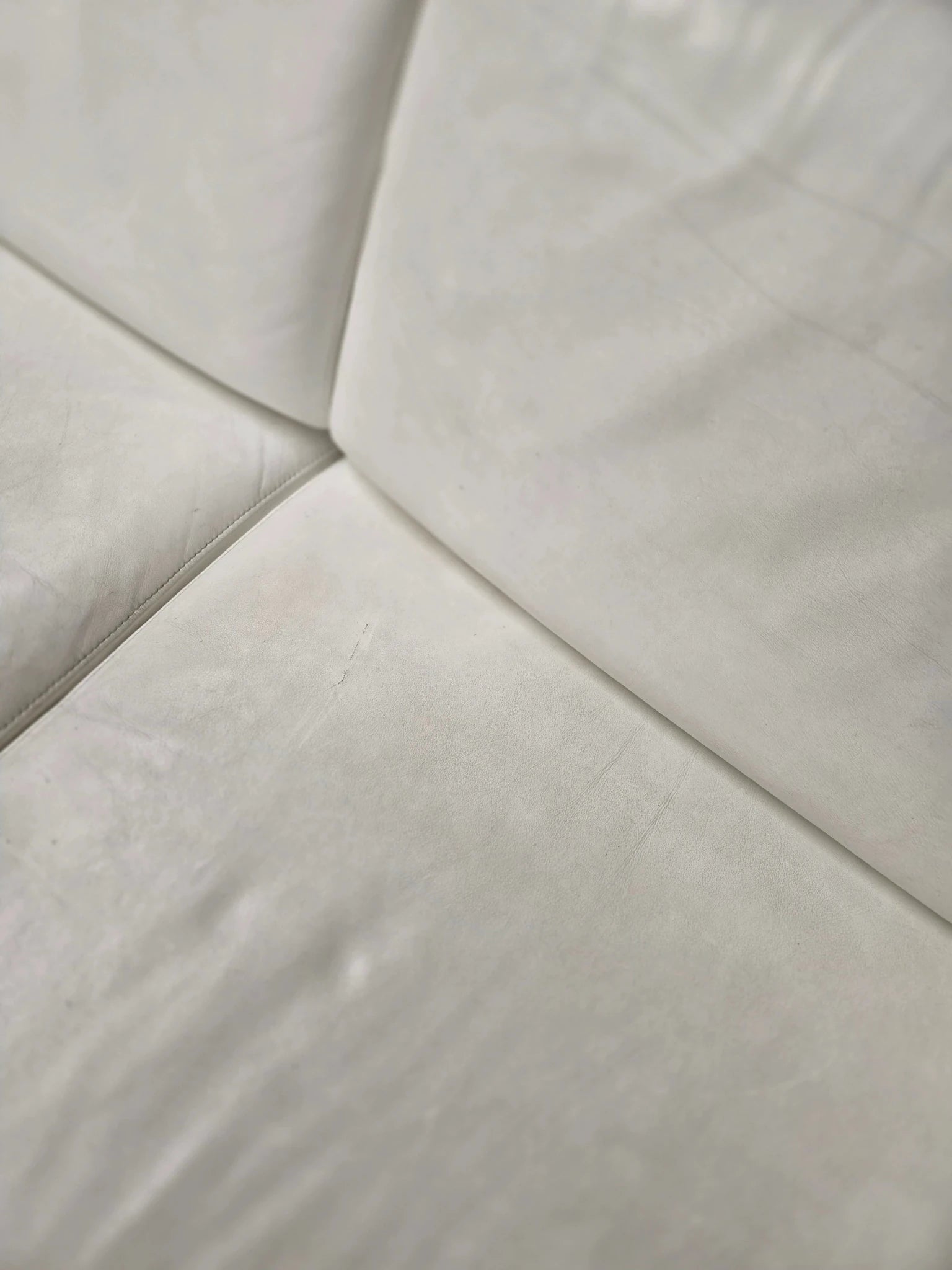 Robin Day Forum Suite: Three - Seater Sofa & Armchair in White Leather - Opulent Seating
